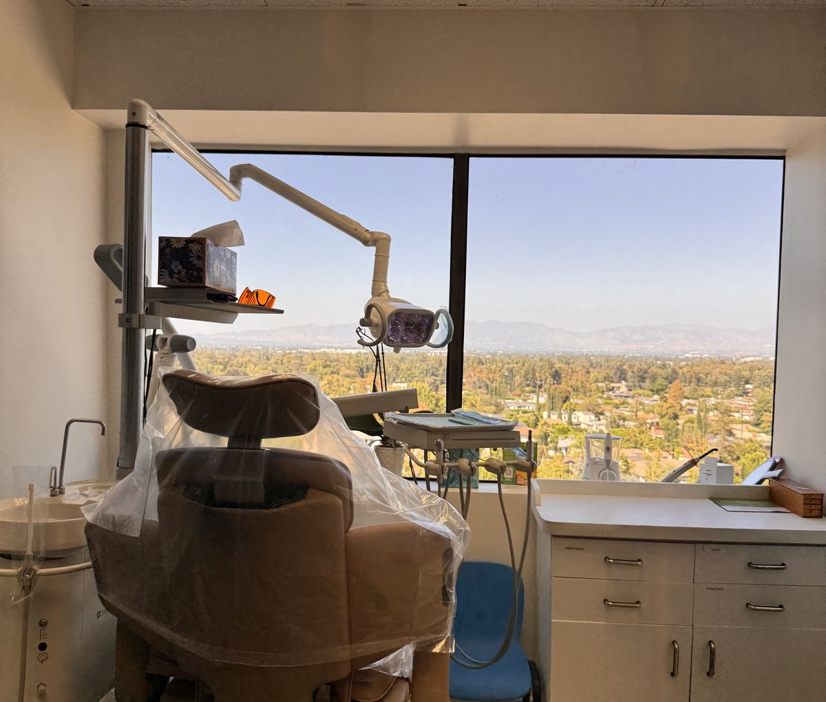 Treatment room at Farzad Dental Encino overlooking the San Fernando Valley