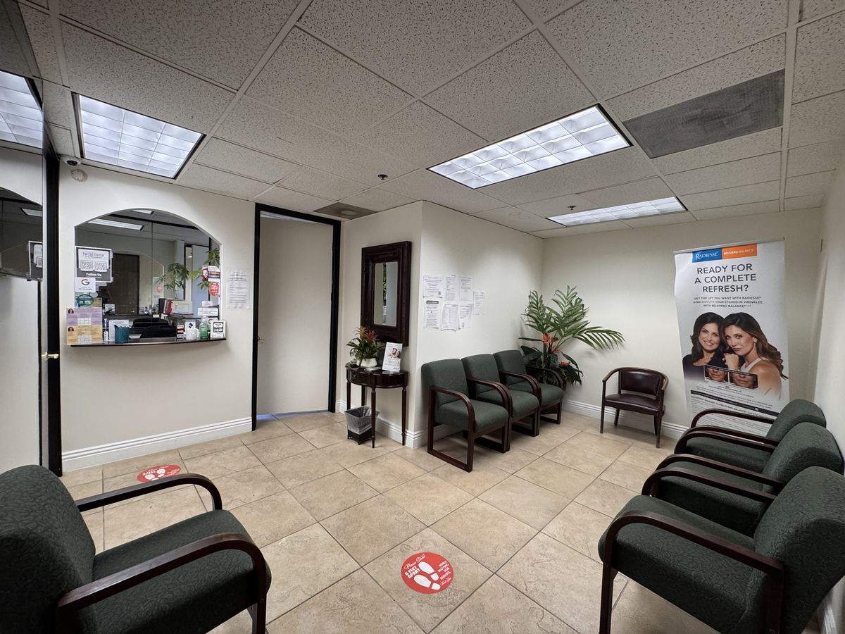 Reception desk and waiting room at Farzad Dental in Encino